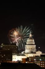 Austin Independence Day fireworks with the Capitol building, as viewed from atop the Manor Garage at The University of Texas at Austin.  The fireworks were launched from Auditorium Shores, downtown Austin, Friday, July 4, 2008.

Filename: SRM_20080704_2139307.jpg
Aperture: f/11.0
Shutter Speed: 6/1
Body: Canon EOS 20D
Lens: Canon EF 80-200mm f/2.8 L