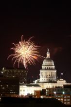 Austin Independence Day fireworks with the Capitol building, as viewed from atop the Manor Garage at The University of Texas at Austin.  The fireworks were launched from Auditorium Shores, downtown Austin, Friday, July 4, 2008.

Filename: SRM_20080704_2139428.jpg
Aperture: f/11.0
Shutter Speed: 6/1
Body: Canon EOS 20D
Lens: Canon EF 80-200mm f/2.8 L