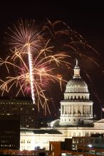 Austin Independence Day fireworks with the Capitol building, as viewed from atop the Manor Garage at The University of Texas at Austin.  The fireworks were launched from Auditorium Shores, downtown Austin, Friday, July 4, 2008.

Filename: SRM_20080704_2142227.jpg
Aperture: f/11.0
Shutter Speed: 6/1
Body: Canon EOS 20D
Lens: Canon EF 80-200mm f/2.8 L