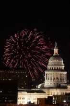 Austin Independence Day fireworks with the Capitol building, as viewed from atop the Manor Garage at The University of Texas at Austin.  The fireworks were launched from Auditorium Shores, downtown Austin, Friday, July 4, 2008.

Filename: SRM_20080704_2144282.jpg
Aperture: f/11.0
Shutter Speed: 2/1
Body: Canon EOS 20D
Lens: Canon EF 80-200mm f/2.8 L