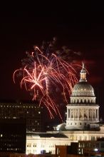 Austin Independence Day fireworks with the Capitol building, as viewed from atop the Manor Garage at The University of Texas at Austin.  The fireworks were launched from Auditorium Shores, downtown Austin, Friday, July 4, 2008.

Filename: SRM_20080704_2146000.jpg
Aperture: f/11.0
Shutter Speed: 5/1
Body: Canon EOS 20D
Lens: Canon EF 80-200mm f/2.8 L