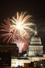 Austin Independence Day fireworks with the Capitol building, as viewed from atop the Manor Garage at The University of Texas at Austin.  The fireworks were launched from Auditorium Shores, downtown Austin, Friday, July 4, 2008.

Filename: SRM_20080704_2146121.jpg
Aperture: f/11.0
Shutter Speed: 5/1
Body: Canon EOS 20D
Lens: Canon EF 80-200mm f/2.8 L