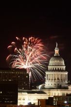 Austin Independence Day fireworks with the Capitol building, as viewed from atop the Manor Garage at The University of Texas at Austin.  The fireworks were launched from Auditorium Shores, downtown Austin, Friday, July 4, 2008.

Filename: SRM_20080704_2147005.jpg
Aperture: f/11.0
Shutter Speed: 5/1
Body: Canon EOS 20D
Lens: Canon EF 80-200mm f/2.8 L