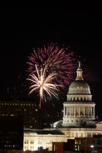 Austin Independence Day fireworks with the Capitol building, as viewed from atop the Manor Garage at The University of Texas at Austin.  The fireworks were launched from Auditorium Shores, downtown Austin, Friday, July 4, 2008.

Filename: SRM_20080704_2149086.jpg
Aperture: f/11.0
Shutter Speed: 2/1
Body: Canon EOS 20D
Lens: Canon EF 80-200mm f/2.8 L