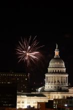 Austin Independence Day fireworks with the Capitol building, as viewed from atop the Manor Garage at The University of Texas at Austin.  The fireworks were launched from Auditorium Shores, downtown Austin, Friday, July 4, 2008.

Filename: SRM_20080704_2149187.jpg
Aperture: f/11.0
Shutter Speed: 2/1
Body: Canon EOS 20D
Lens: Canon EF 80-200mm f/2.8 L