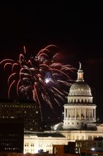 Austin Independence Day fireworks with the Capitol building, as viewed from atop the Manor Garage at The University of Texas at Austin.  The fireworks were launched from Auditorium Shores, downtown Austin, Friday, July 4, 2008.

Filename: SRM_20080704_2151126.jpg
Aperture: f/11.0
Shutter Speed: 5/1
Body: Canon EOS 20D
Lens: Canon EF 80-200mm f/2.8 L