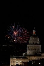 Austin Independence Day fireworks with the Capitol building, as viewed from atop the Manor Garage at The University of Texas at Austin.  The fireworks were launched from Auditorium Shores, downtown Austin, Friday, July 4, 2008.

Filename: SRM_20080704_2153580.jpg
Aperture: f/11.0
Shutter Speed: 1/1
Body: Canon EOS 20D
Lens: Canon EF 80-200mm f/2.8 L