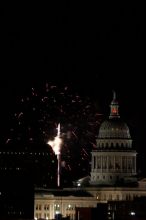 Austin Independence Day fireworks with the Capitol building, as viewed from atop the Manor Garage at The University of Texas at Austin.  The fireworks were launched from Auditorium Shores, downtown Austin, Friday, July 4, 2008.

Filename: SRM_20080704_2154083.jpg
Aperture: f/11.0
Shutter Speed: 1/1
Body: Canon EOS 20D
Lens: Canon EF 80-200mm f/2.8 L