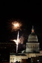 Austin Independence Day fireworks with the Capitol building, as viewed from atop the Manor Garage at The University of Texas at Austin.  The fireworks were launched from Auditorium Shores, downtown Austin, Friday, July 4, 2008.

Filename: SRM_20080704_2154144.jpg
Aperture: f/11.0
Shutter Speed: 2/1
Body: Canon EOS 20D
Lens: Canon EF 80-200mm f/2.8 L