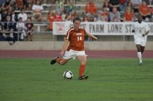 UT senior Kasey Moore (#14, Defender) clears the ball.  The University of Texas women's soccer team tied 0-0 against the Texas A&M Aggies Friday night, September 27, 2008.

Filename: SRM_20080926_1909087.jpg
Aperture: f/4.0
Shutter Speed: 1/800
Body: Canon EOS-1D Mark II
Lens: Canon EF 300mm f/2.8 L IS