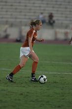 UT freshman Kylie Doniak (#15, Midfielder).  The University of Texas women's soccer team tied 0-0 against the Texas A&M Aggies Friday night, September 27, 2008.

Filename: SRM_20080926_1911100.jpg
Aperture: f/4.0
Shutter Speed: 1/800
Body: Canon EOS-1D Mark II
Lens: Canon EF 300mm f/2.8 L IS