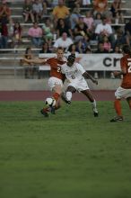 UT junior Emily Anderson (#21, Forward).  The University of Texas women's soccer team tied 0-0 against the Texas A&M Aggies Friday night, September 27, 2008.

Filename: SRM_20080926_1914405.jpg
Aperture: f/4.0
Shutter Speed: 1/800
Body: Canon EOS-1D Mark II
Lens: Canon EF 300mm f/2.8 L IS