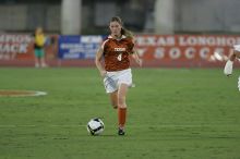 UT senior Jill Gilbeau (#4, Defender and Midfielder).  The University of Texas women's soccer team tied 0-0 against the Texas A&M Aggies Friday night, September 27, 2008.

Filename: SRM_20080926_1922204.jpg
Aperture: f/4.0
Shutter Speed: 1/400
Body: Canon EOS-1D Mark II
Lens: Canon EF 300mm f/2.8 L IS