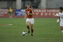 UT senior Jill Gilbeau (#4, Defender and Midfielder).  The University of Texas women's soccer team tied 0-0 against the Texas A&M Aggies Friday night, September 27, 2008.

Filename: SRM_20080926_1922225.jpg
Aperture: f/4.0
Shutter Speed: 1/500
Body: Canon EOS-1D Mark II
Lens: Canon EF 300mm f/2.8 L IS