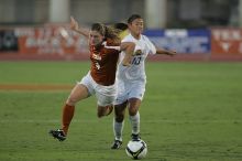 UT senior Jill Gilbeau (#4, Defender and Midfielder).  The University of Texas women's soccer team tied 0-0 against the Texas A&M Aggies Friday night, September 27, 2008.

Filename: SRM_20080926_1922240.jpg
Aperture: f/4.0
Shutter Speed: 1/400
Body: Canon EOS-1D Mark II
Lens: Canon EF 300mm f/2.8 L IS