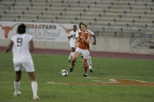 UT freshman Courtney Goodson (#7, Forward and Midfielder).  The University of Texas women's soccer team tied 0-0 against the Texas A&M Aggies Friday night, September 27, 2008.

Filename: SRM_20080926_1924203.jpg
Aperture: f/4.0
Shutter Speed: 1/500
Body: Canon EOS-1D Mark II
Lens: Canon EF 300mm f/2.8 L IS