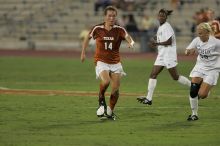 UT senior Kasey Moore (#14, Defender) brings the ball downfield.  The University of Texas women's soccer team tied 0-0 against the Texas A&M Aggies Friday night, September 27, 2008.

Filename: SRM_20080926_1935387.jpg
Aperture: f/4.0
Shutter Speed: 1/500
Body: Canon EOS-1D Mark II
Lens: Canon EF 300mm f/2.8 L IS