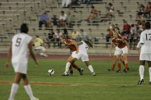 UT freshman Kylie Doniak (#15, Midfielder) tries to turn the ball as UT freshman Lucy Keith (#6, Midfielder) gives her support.  The University of Texas women's soccer team tied 0-0 against the Texas A&M Aggies Friday night, September 27, 2008.