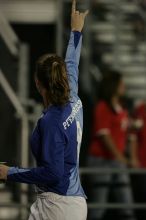 UT senior Dianna Pfenninger (#8, Goalkeeper) gives a Hook'em to the fans as they leave the field at the end of the first half.  The University of Texas women's soccer team tied 0-0 against the Texas A&M Aggies Friday night, September 27, 2008.

Filename: SRM_20080926_1948165.jpg
Aperture: f/2.8
Shutter Speed: 1/500
Body: Canon EOS-1D Mark II
Lens: Canon EF 300mm f/2.8 L IS