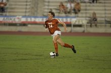 UT senior Kasey Moore (#14, Defender).  The University of Texas women's soccer team tied 0-0 against the Texas A&M Aggies Friday night, September 27, 2008.

Filename: SRM_20080926_2012101.jpg
Aperture: f/2.8
Shutter Speed: 1/500
Body: Canon EOS-1D Mark II
Lens: Canon EF 300mm f/2.8 L IS