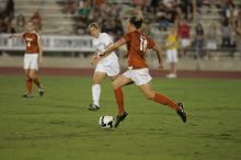 UT senior Kasey Moore (#14, Defender).  The University of Texas women's soccer team tied 0-0 against the Texas A&M Aggies Friday night, September 27, 2008.

Filename: SRM_20080926_2012126.jpg
Aperture: f/2.8
Shutter Speed: 1/500
Body: Canon EOS-1D Mark II
Lens: Canon EF 300mm f/2.8 L IS