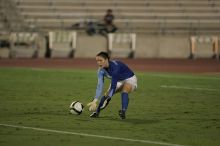 UT senior Dianna Pfenninger (#8, Goalkeeper) scoops up the ball.  The University of Texas women's soccer team tied 0-0 against the Texas A&M Aggies Friday night, September 27, 2008.

Filename: SRM_20080926_2014420.jpg
Aperture: f/2.8
Shutter Speed: 1/640
Body: Canon EOS-1D Mark II
Lens: Canon EF 300mm f/2.8 L IS