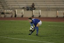 UT senior Dianna Pfenninger (#8, Goalkeeper) scoops up the ball.  The University of Texas women's soccer team tied 0-0 against the Texas A&M Aggies Friday night, September 27, 2008.

Filename: SRM_20080926_2014421.jpg
Aperture: f/2.8
Shutter Speed: 1/640
Body: Canon EOS-1D Mark II
Lens: Canon EF 300mm f/2.8 L IS