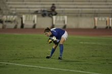 UT senior Dianna Pfenninger (#8, Goalkeeper) scoops up the ball.  The University of Texas women's soccer team tied 0-0 against the Texas A&M Aggies Friday night, September 27, 2008.

Filename: SRM_20080926_2014422.jpg
Aperture: f/2.8
Shutter Speed: 1/640
Body: Canon EOS-1D Mark II
Lens: Canon EF 300mm f/2.8 L IS