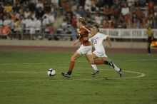 UT freshman Kylie Doniak (#15, Midfielder).  The University of Texas women's soccer team tied 0-0 against the Texas A&M Aggies Friday night, September 27, 2008.

Filename: SRM_20080926_2031483.jpg
Aperture: f/2.8
Shutter Speed: 1/640
Body: Canon EOS-1D Mark II
Lens: Canon EF 300mm f/2.8 L IS