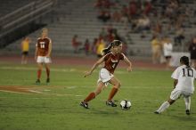 UT senior Jill Gilbeau (#4, Defender and Midfielder).  The University of Texas women's soccer team tied 0-0 against the Texas A&M Aggies Friday night, September 27, 2008.

Filename: SRM_20080926_2047224.jpg
Aperture: f/2.8
Shutter Speed: 1/500
Body: Canon EOS-1D Mark II
Lens: Canon EF 300mm f/2.8 L IS