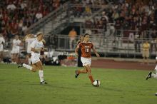 UT senior Stephanie Logterman (#10, Defender).  The University of Texas women's soccer team tied 0-0 against the Texas A&M Aggies Friday night, September 27, 2008.

Filename: SRM_20080926_2048264.jpg
Aperture: f/2.8
Shutter Speed: 1/500
Body: Canon EOS-1D Mark II
Lens: Canon EF 300mm f/2.8 L IS