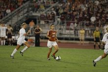 UT senior Stephanie Logterman (#10, Defender).  The University of Texas women's soccer team tied 0-0 against the Texas A&M Aggies Friday night, September 27, 2008.

Filename: SRM_20080926_2048285.jpg
Aperture: f/2.8
Shutter Speed: 1/500
Body: Canon EOS-1D Mark II
Lens: Canon EF 300mm f/2.8 L IS