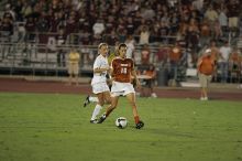 UT senior Stephanie Logterman (#10, Defender).  The University of Texas women's soccer team tied 0-0 against the Texas A&M Aggies Friday night, September 27, 2008.

Filename: SRM_20080926_2048286.jpg
Aperture: f/2.8
Shutter Speed: 1/500
Body: Canon EOS-1D Mark II
Lens: Canon EF 300mm f/2.8 L IS