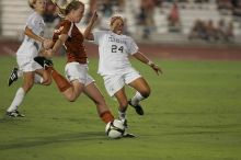 UT freshman Courtney Goodson (#7, Forward and Midfielder) takes the ball down the field.  The University of Texas women's soccer team tied 0-0 against the Texas A&M Aggies Friday night, September 27, 2008.

Filename: SRM_20080926_2048348.jpg
Aperture: f/2.8
Shutter Speed: 1/500
Body: Canon EOS-1D Mark II
Lens: Canon EF 300mm f/2.8 L IS