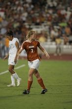 UT freshman Courtney Goodson (#7, Forward and Midfielder) takes the ball down the field.  The University of Texas women's soccer team tied 0-0 against the Texas A&M Aggies Friday night, September 27, 2008.

Filename: SRM_20080926_2048402.jpg
Aperture: f/2.8
Shutter Speed: 1/500
Body: Canon EOS-1D Mark II
Lens: Canon EF 300mm f/2.8 L IS