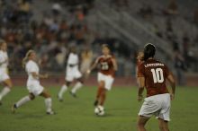 UT senior Stephanie Logterman (#10, Defender) waits for a pass from UT senior Courtney Gaines (#23, Midfielder).  The University of Texas women's soccer team tied 0-0 against the Texas A&M Aggies Friday night, September 27, 2008.

Filename: SRM_20080926_2056044.jpg
Aperture: f/2.8
Shutter Speed: 1/640
Body: Canon EOS-1D Mark II
Lens: Canon EF 300mm f/2.8 L IS