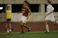 UT senior Stephanie Logterman (#10, Defender).  The University of Texas women's soccer team tied 0-0 against the Texas A&M Aggies Friday night, September 27, 2008.

Filename: SRM_20080926_2058023.jpg
Aperture: f/2.8
Shutter Speed: 1/640
Body: Canon EOS-1D Mark II
Lens: Canon EF 300mm f/2.8 L IS