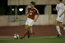 UT senior Stephanie Logterman (#10, Defender).  The University of Texas women's soccer team tied 0-0 against the Texas A&M Aggies Friday night, September 27, 2008.

Filename: SRM_20080926_2058024.jpg
Aperture: f/2.8
Shutter Speed: 1/640
Body: Canon EOS-1D Mark II
Lens: Canon EF 300mm f/2.8 L IS