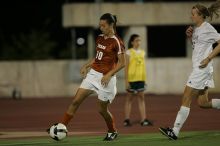 UT senior Stephanie Logterman (#10, Defender).  The University of Texas women's soccer team tied 0-0 against the Texas A&M Aggies Friday night, September 27, 2008.

Filename: SRM_20080926_2058025.jpg
Aperture: f/2.8
Shutter Speed: 1/640
Body: Canon EOS-1D Mark II
Lens: Canon EF 300mm f/2.8 L IS