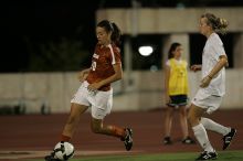 UT senior Stephanie Logterman (#10, Defender).  The University of Texas women's soccer team tied 0-0 against the Texas A&M Aggies Friday night, September 27, 2008.

Filename: SRM_20080926_2058046.jpg
Aperture: f/2.8
Shutter Speed: 1/640
Body: Canon EOS-1D Mark II
Lens: Canon EF 300mm f/2.8 L IS