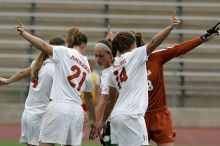 UT senior Jill Gilbeau (#4, Defender and Midfielder), UT junior Emily Anderson (#21, Forward), UT senior Kasey Moore (#14, Defender), UT senior Dianna Pfenninger (#8, Goalkeeper), and UT sophomore Erica Campanelli (#19, Defender) get ready to start the game.  The University of Texas women's soccer team won 2-1 against the Iowa State Cyclones Sunday afternoon, October 5, 2008.

Filename: SRM_20081005_11573269.jpg
Aperture: f/8.0
Shutter Speed: 1/1000
Body: Canon EOS-1D Mark II
Lens: Canon EF 300mm f/2.8 L IS