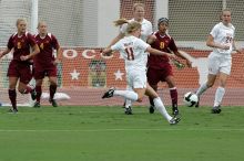 UT sophomore Niki Arlitt (#11, Forward) takes a shot on goal.  The University of Texas women's soccer team won 2-1 against the Iowa State Cyclones Sunday afternoon, October 5, 2008.

Filename: SRM_20081005_11594083.jpg
Aperture: f/8.0
Shutter Speed: 1/1000
Body: Canon EOS-1D Mark II
Lens: Canon EF 300mm f/2.8 L IS