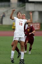 UT senior Stephanie Logterman (#10, Defender) awaits a header.  The University of Texas women's soccer team won 2-1 against the Iowa State Cyclones Sunday afternoon, October 5, 2008.

Filename: SRM_20081005_12025416.jpg
Aperture: f/5.6
Shutter Speed: 1/2000
Body: Canon EOS-1D Mark II
Lens: Canon EF 300mm f/2.8 L IS