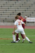 UT junior Emily Anderson (#21, Forward) plays defense.  The University of Texas women's soccer team won 2-1 against the Iowa State Cyclones Sunday afternoon, October 5, 2008.

Filename: SRM_20081005_12085028.jpg
Aperture: f/5.6
Shutter Speed: 1/1600
Body: Canon EOS-1D Mark II
Lens: Canon EF 300mm f/2.8 L IS