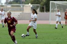 UT senior Stephanie Logterman (#10, Defender).  The University of Texas women's soccer team won 2-1 against the Iowa State Cyclones Sunday afternoon, October 5, 2008.

Filename: SRM_20081005_12123083.jpg
Aperture: f/5.6
Shutter Speed: 1/2000
Body: Canon EOS-1D Mark II
Lens: Canon EF 300mm f/2.8 L IS