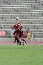 UT freshman Kylie Doniak (#15, Midfielder) jumps for the header.  The University of Texas women's soccer team won 2-1 against the Iowa State Cyclones Sunday afternoon, October 5, 2008.

Filename: SRM_20081005_12152613.jpg
Aperture: f/5.6
Shutter Speed: 1/1000
Body: Canon EOS-1D Mark II
Lens: Canon EF 300mm f/2.8 L IS