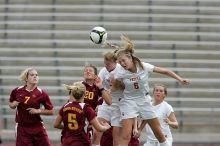 UT freshman Lucy Keith (#6, Midfielder) and UT freshman Courtney Goodson (#7, Forward and Midfielder) fight for the header as UT senior Kasey Moore (#14, Defender) watches.  Keith makes contact, which was an assist to UT junior Emily Anderson (#21, Forward).  The University of Texas women's soccer team won 2-1 against the Iowa State Cyclones Sunday afternoon, October 5, 2008.

Filename: SRM_20081005_12210085.jpg
Aperture: f/5.0
Shutter Speed: 1/1600
Body: Canon EOS-1D Mark II
Lens: Canon EF 300mm f/2.8 L IS