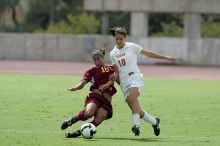 UT senior Stephanie Logterman (#10, Defender).  The University of Texas women's soccer team won 2-1 against the Iowa State Cyclones Sunday afternoon, October 5, 2008.

Filename: SRM_20081005_12221817.jpg
Aperture: f/5.0
Shutter Speed: 1/2000
Body: Canon EOS-1D Mark II
Lens: Canon EF 300mm f/2.8 L IS