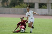 UT senior Stephanie Logterman (#10, Defender).  The University of Texas women's soccer team won 2-1 against the Iowa State Cyclones Sunday afternoon, October 5, 2008.

Filename: SRM_20081005_12221818.jpg
Aperture: f/5.0
Shutter Speed: 1/2500
Body: Canon EOS-1D Mark II
Lens: Canon EF 300mm f/2.8 L IS