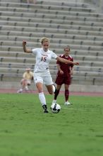 UT freshman Kylie Doniak (#15, Midfielder).  The University of Texas women's soccer team won 2-1 against the Iowa State Cyclones Sunday afternoon, October 5, 2008.

Filename: SRM_20081005_12244450.jpg
Aperture: f/5.6
Shutter Speed: 1/1600
Body: Canon EOS-1D Mark II
Lens: Canon EF 300mm f/2.8 L IS